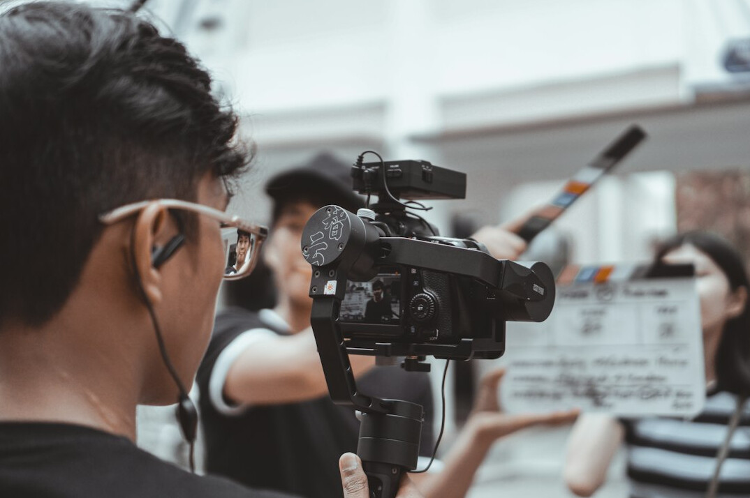 young director reviewing footage