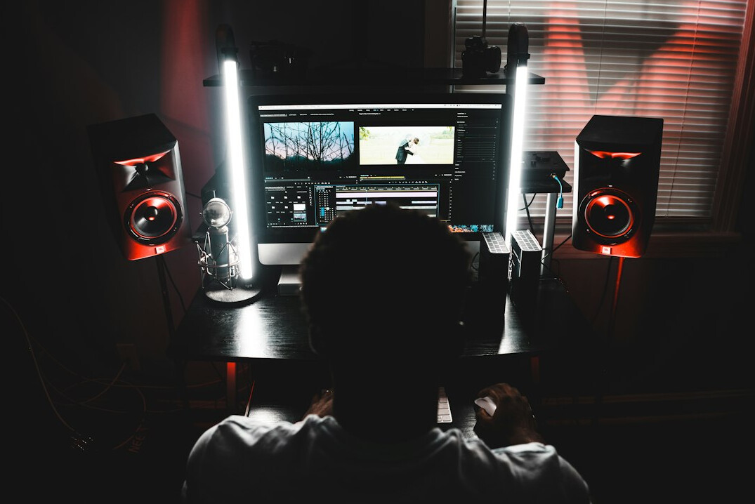 video editor working on computer