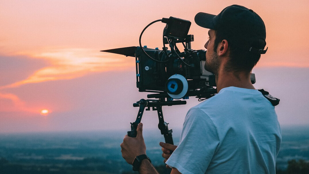 filmmaker reviewing footage
