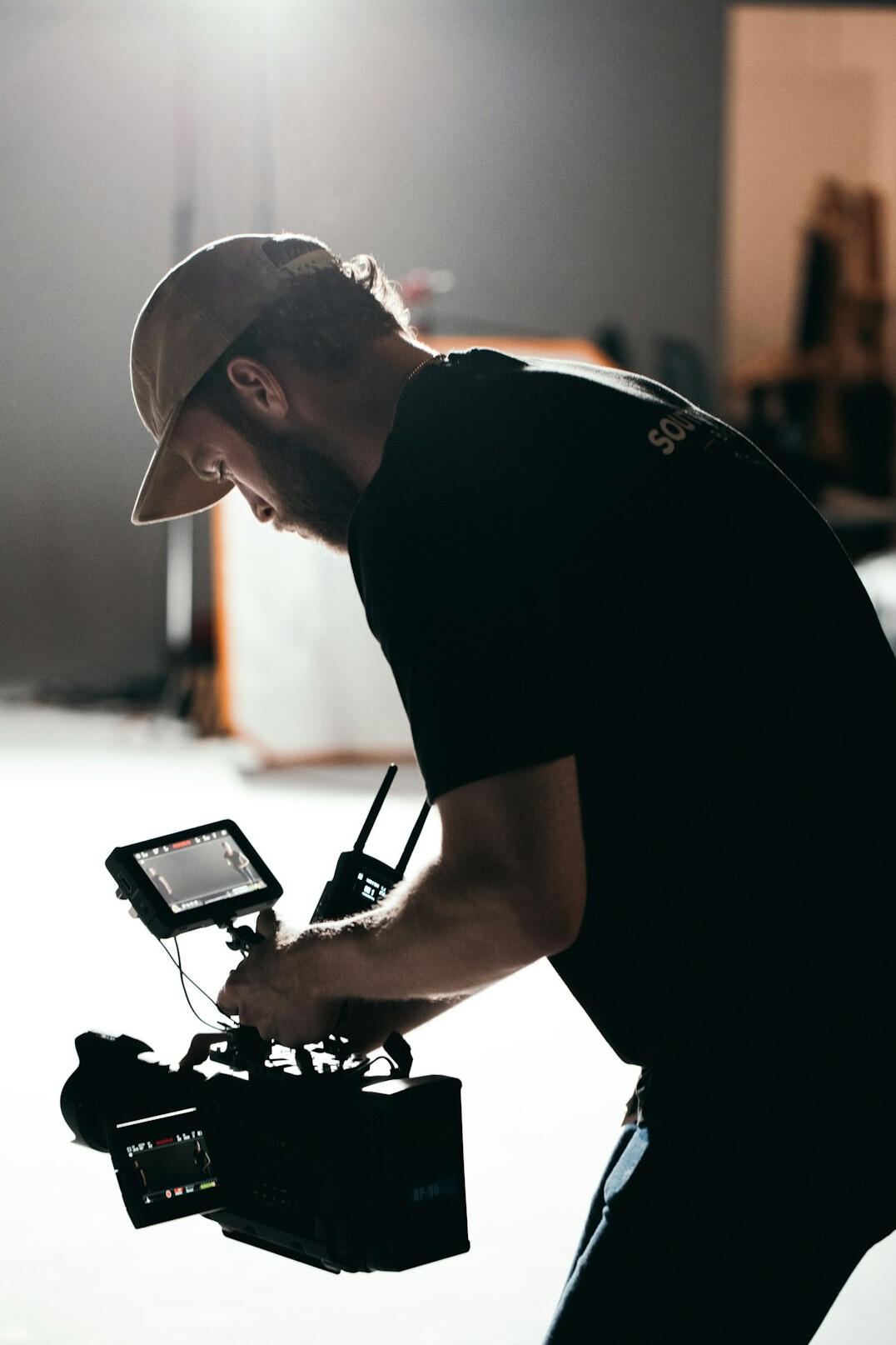 filmmaker holding professional camera