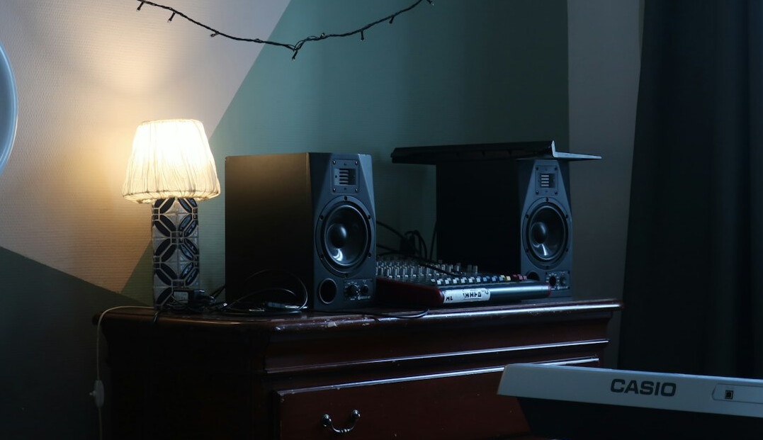 Video editor working at a color grading suite with multiple monitors