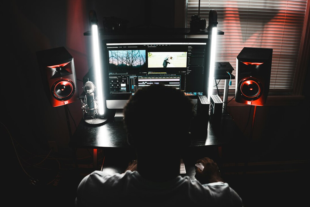 filmmaker editing on computer