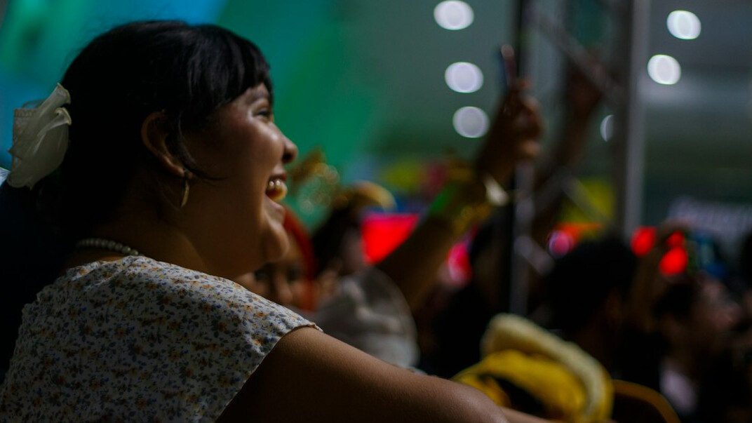 happy audience watching video